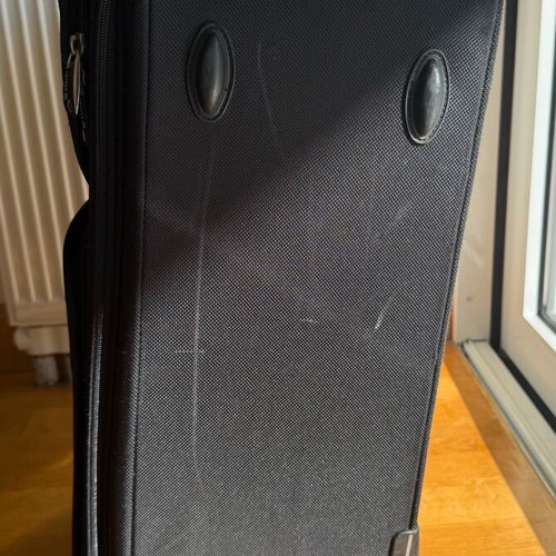 Delsey Black Medium Suitcase used with wheels