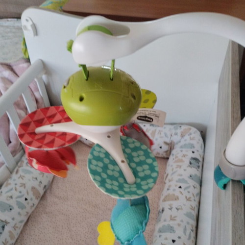 Tiny Love rotating toy used with music and colorful animals