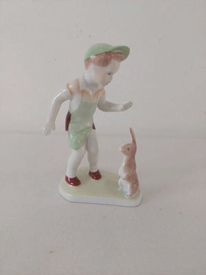 Child with rabbit decoration used