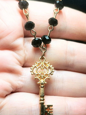 Secret Garden Key necklace like new, black and gold