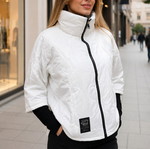 Short white jacket with knitted cuffs