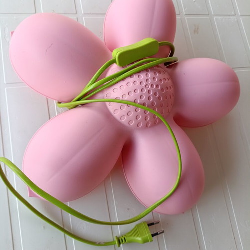 Smila Blomma children's wall light in pink flower shape