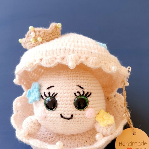 Amigurumi pearl doll Margaritarenia in handmade crochet shell