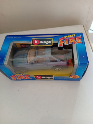 Freelander metal model car by Bburago new, scale 1/43, gray