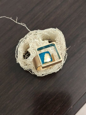 Ring made of brass with gold plating new, gold-colored
