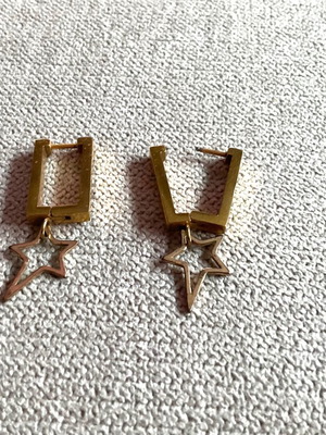 Steel earrings in gold color like new