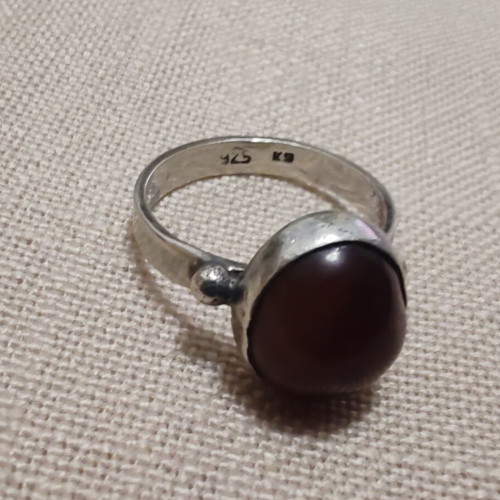 Silver ring used with gold and possible carnelian stone