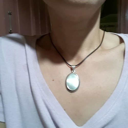 Silver pendant used with hallmark