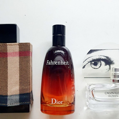 Empty Dior Fahrenheit, Calvin Klein Woman, Burberry London perfume bottles used
