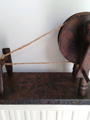 Small wooden spinning wheel used