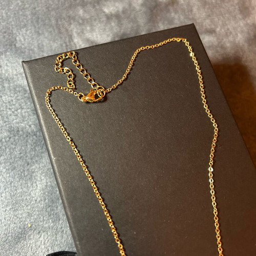 Set of 2 pendants letter M and infinity symbol gold color, new