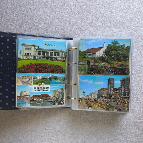Postcard album like new with 200 postcards from around the world