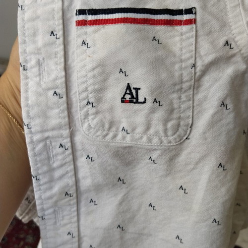 Baby shirt like new with minor spots