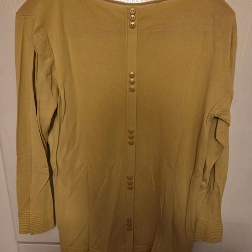 Yellow spring blouse used, size small with buttons on back