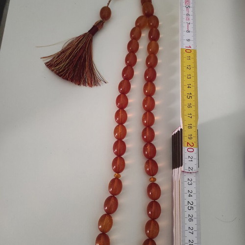 Mastic komboloi with orange shades, 33 beads