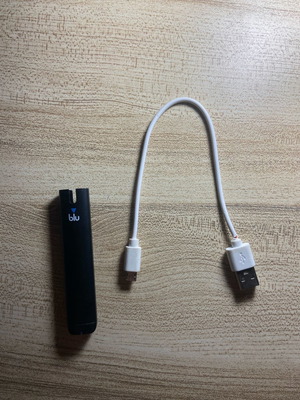 Myblu Black electronic cigarette used with charger