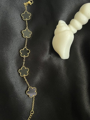 Bracelet new, gold plated stainless steel with black enamel clover design