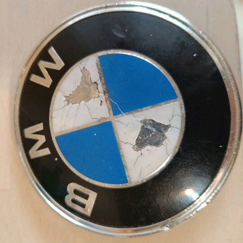 BMW car emblem used with wear from time