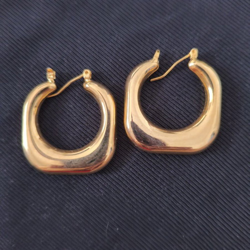 Earrings new, gold color, surgical steel, unique design