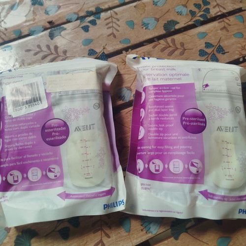 Ameda Double Breast Pump like new with 3 bottles and milk storage bags