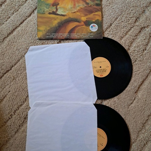 Rock music collection used, double vinyl with torn cover