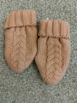 Knitted baby gloves like new in salmon color