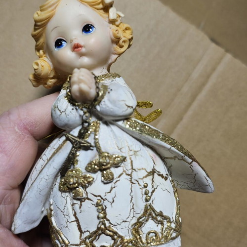 Ceramic decorative angel figurine used