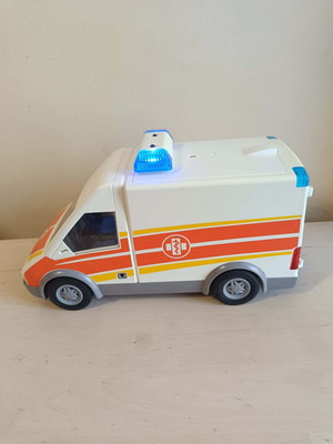 Playmobil ambulance used with working lights and siren