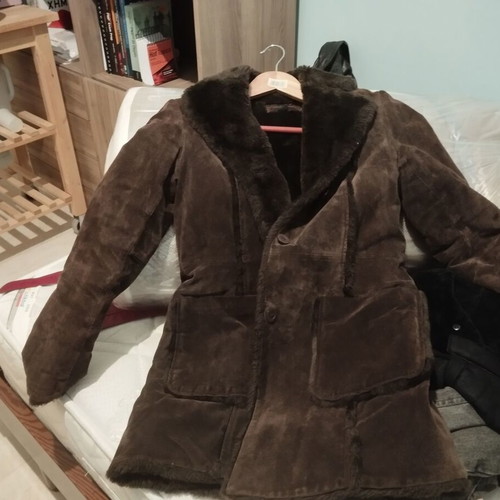 Brown half coat with fur used, synthetic