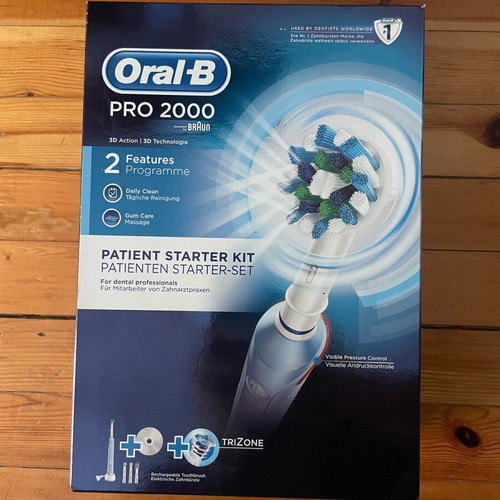 Oral B Pro 2000 electric toothbrush new with 4 heads, timer and pressure sensor