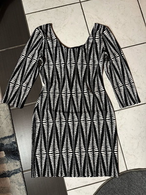 Bodycon dress used, 3/4 sleeves, black and white