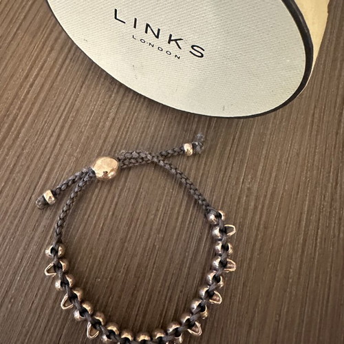 Links Of London collectible bracelet like new, rose gold and black cord