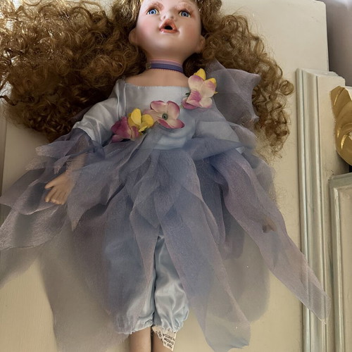 Porcelain doll fairy like new