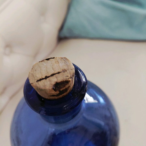 Vintage blue glass bottle used from the 1960s