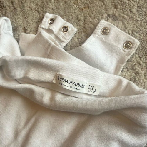 Stradivarius white long-sleeve bodysuit used with unique neckline