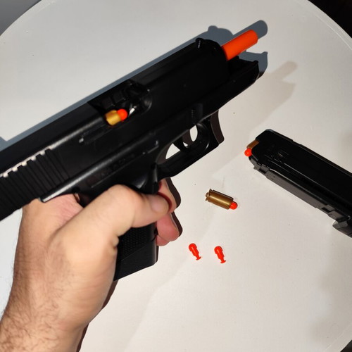 G26 9x19 Semi-Automatic Toy Pistol new with 6 shells and 20 plastic bullets