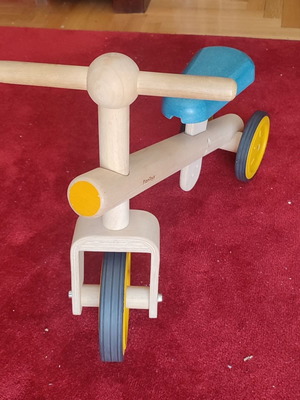 PlanToys toddler balance bike used, solid wood