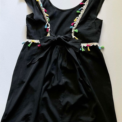 Dress with open back and bow used, black with colorful tassels
