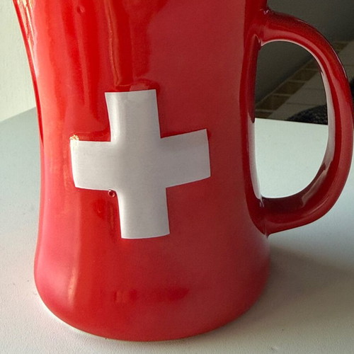 Large Swiss flag mug new with embossed cross