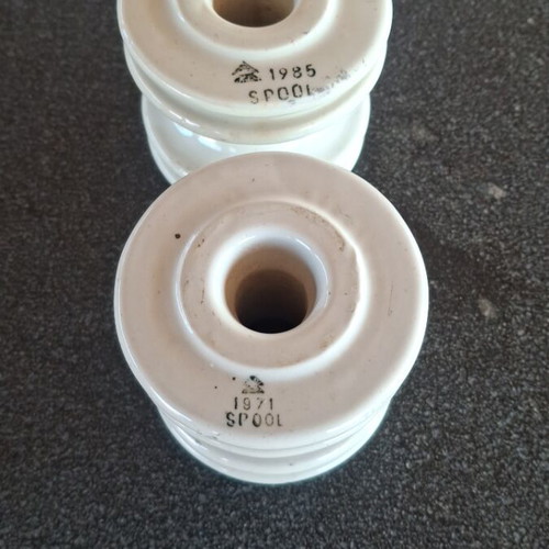 Insulators used, set of two, 7.5 cm diameter
