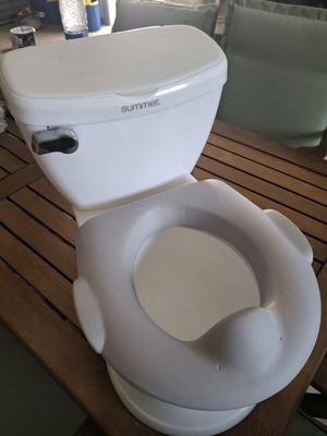 Toddler potty like new with removable container and flushing sound