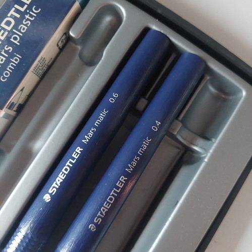 Staedtler drawing set used with rapidograph 0.4 and 0.6, eraser, compass adapter, and 0.5 leads