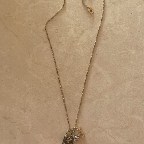 Juicy Couture necklace with gold chain and adjustable rings, like new