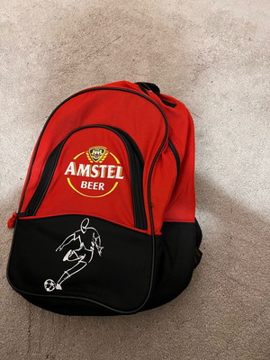 Amstel διαφημιστικό backpack σε κόκκινο και μαύρο, 40 x 25 εκ.