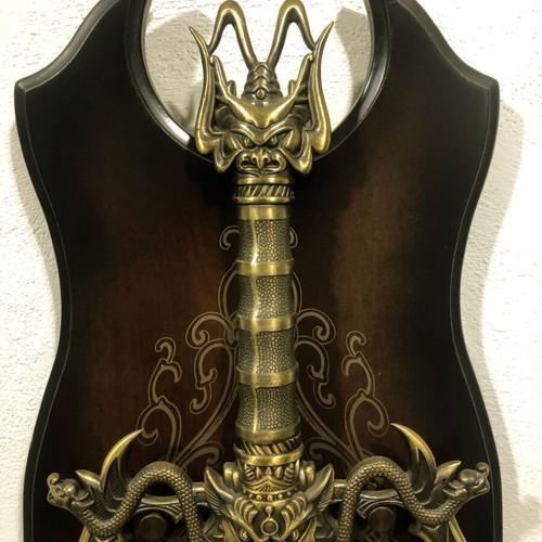 Decorative sword used on wooden wall mount with stainless steel blade