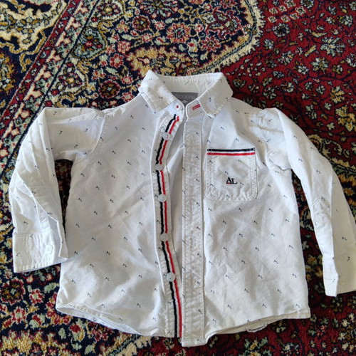 Baby shirt like new with minor spots