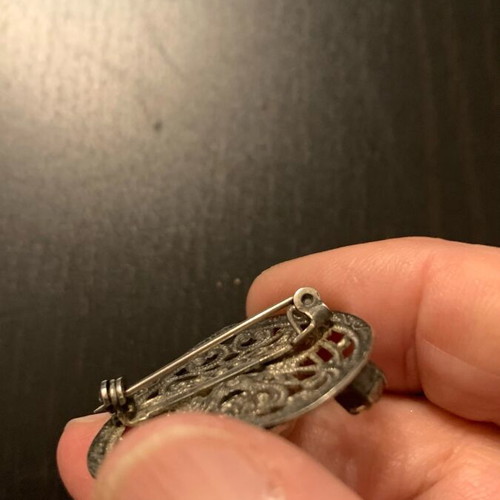 Old brooch used