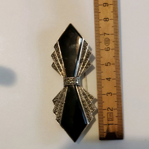 Silver brooch like new, 8 cm length, 22 grams, black and silver