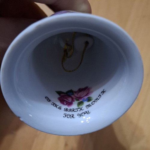 Vintage porcelain bell with February theme like new