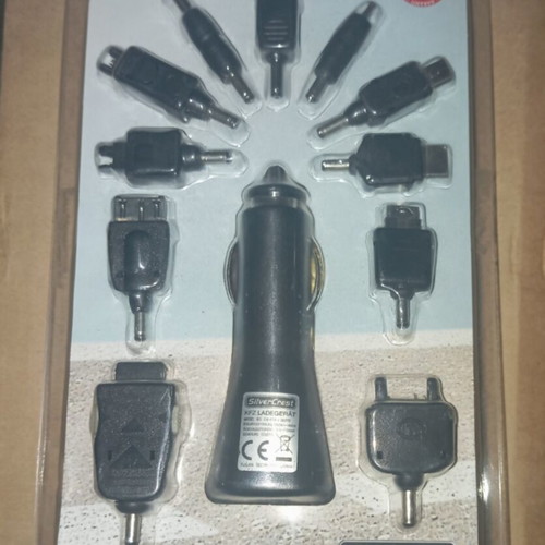 Car Charger set with 11 adapters new, includes cables